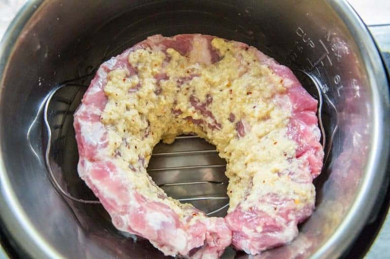 instant pot ribs uncooked inside instant pot on trivet