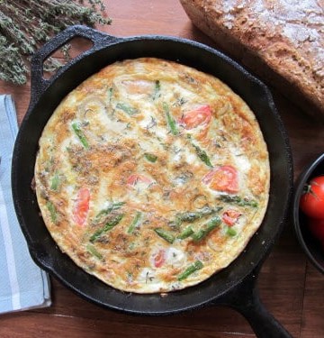 asparagus frittata with feta and thyme in a baking dish