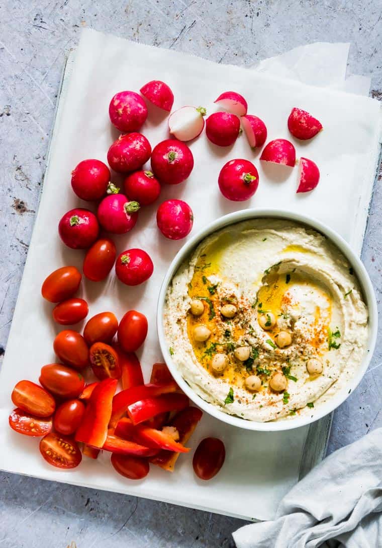 Classic Hummus with veggies on a table