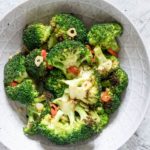 Grilled Broccoli in a bowl seasoned with garlic and chili