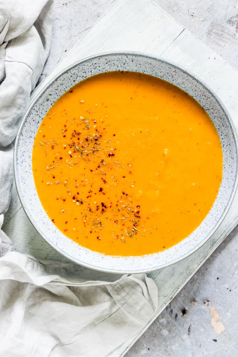 close up of a bowl of pressure cooker curried carrot soup