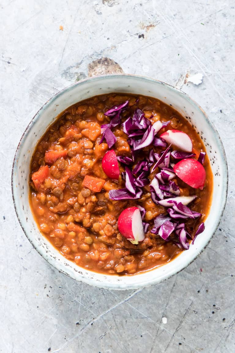 mexican lentils in a bolw with radishes and red cabbage