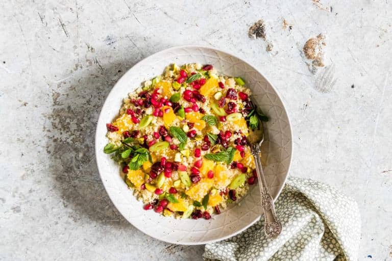 Quick and easy orange pistachio pomegranate couscous salad recipe ready in less than 15 mins. Landscape image. A colourful vegan and vegetarian side dish – recipesfromapantry.com #couscous #couscoussalad #easycouscous #christmasrecipe #howtomakecouscoussalad #vegetariancouscous #moroccancouscous