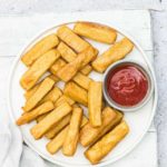 plate of air fryer polenta fries with ketchup