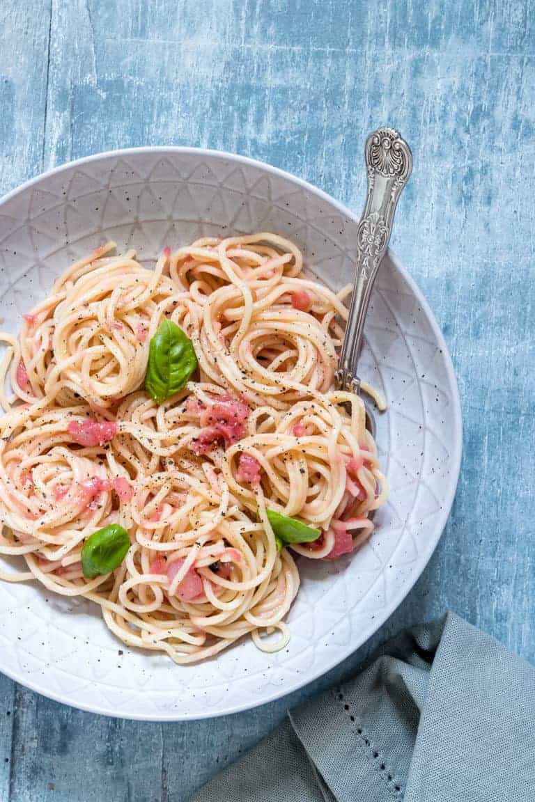 a bowl of pasta with rhubarb sauce