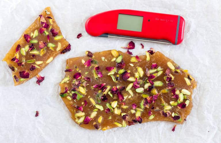 Pistachio cardamom butter brittle with rose petals - Recipes From A Pantry