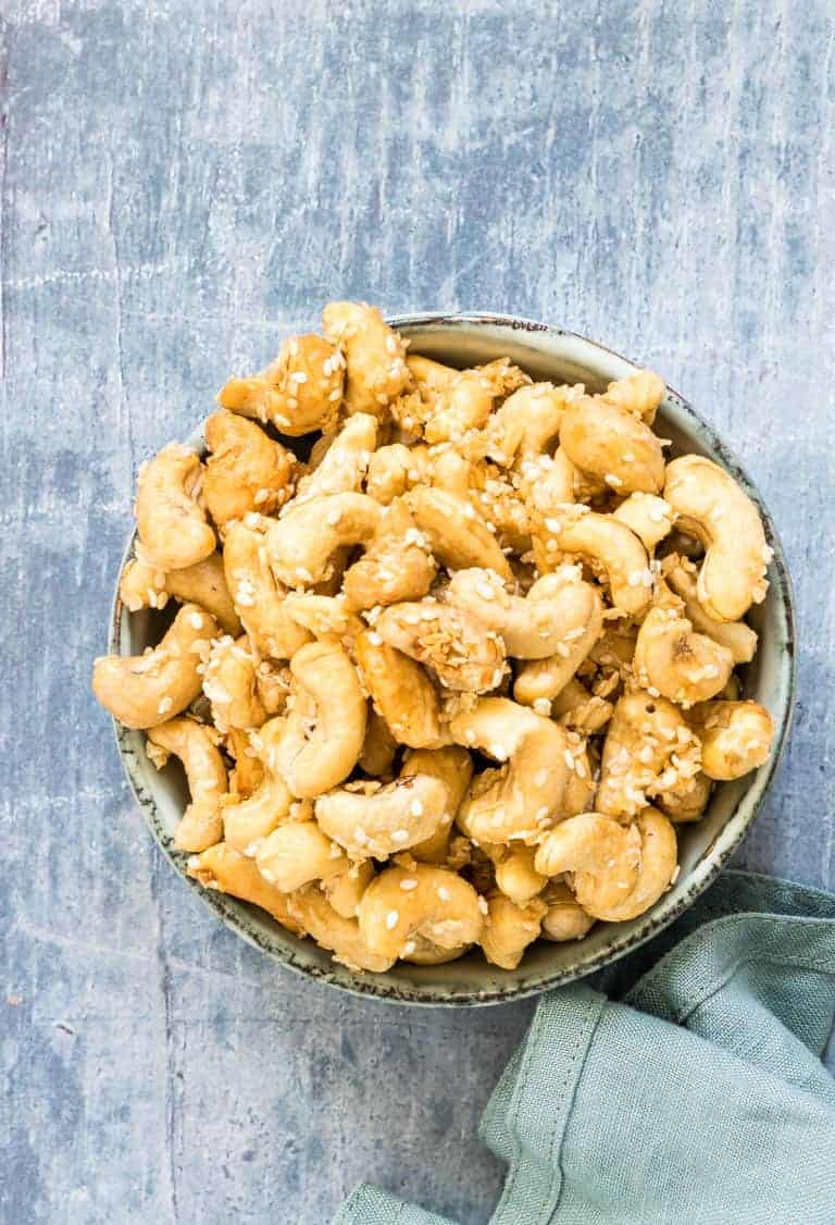 a bowl of roasted coconut cashews