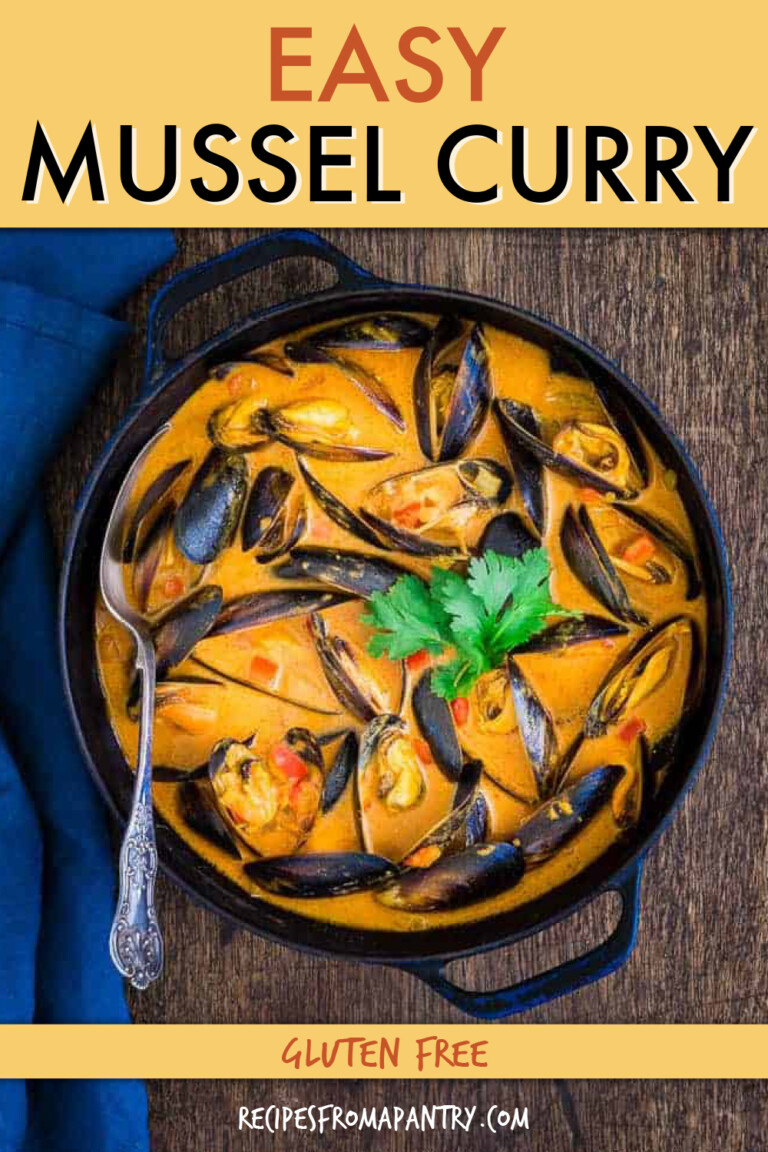 Overhead view of mussel curry in a stew pot