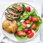 air fryer mushroom steaks served with a green salad