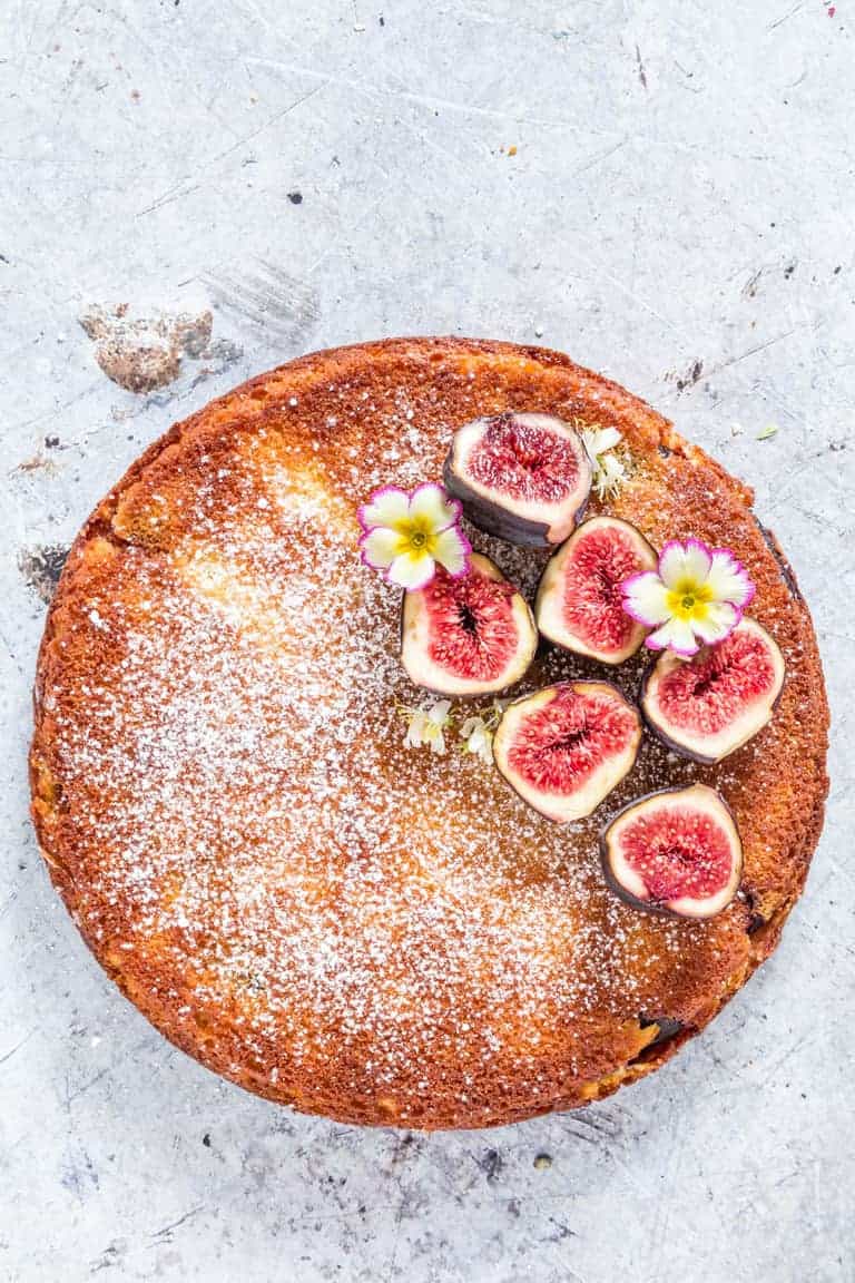 Fig And Semolina Cake topped with figs and flowers
