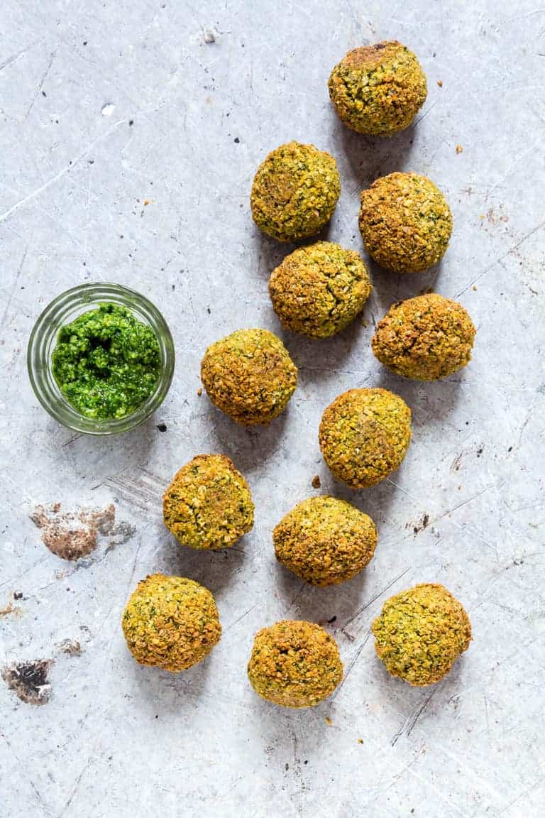 Easy Falafel Recipe - falafels on a table with a dip