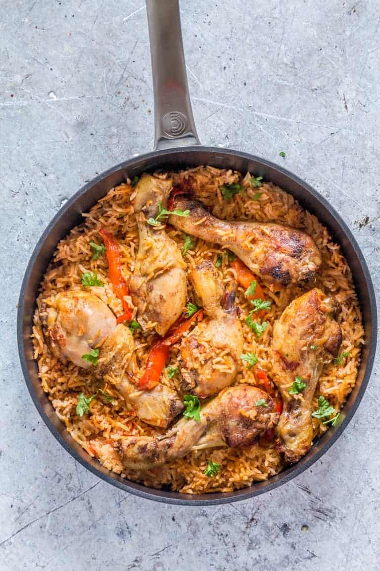This easy gluten-free, chicken Jollof rice is made with chicken, tomatoes, peppers and rice. African recipe. | recipesfromapantry.com