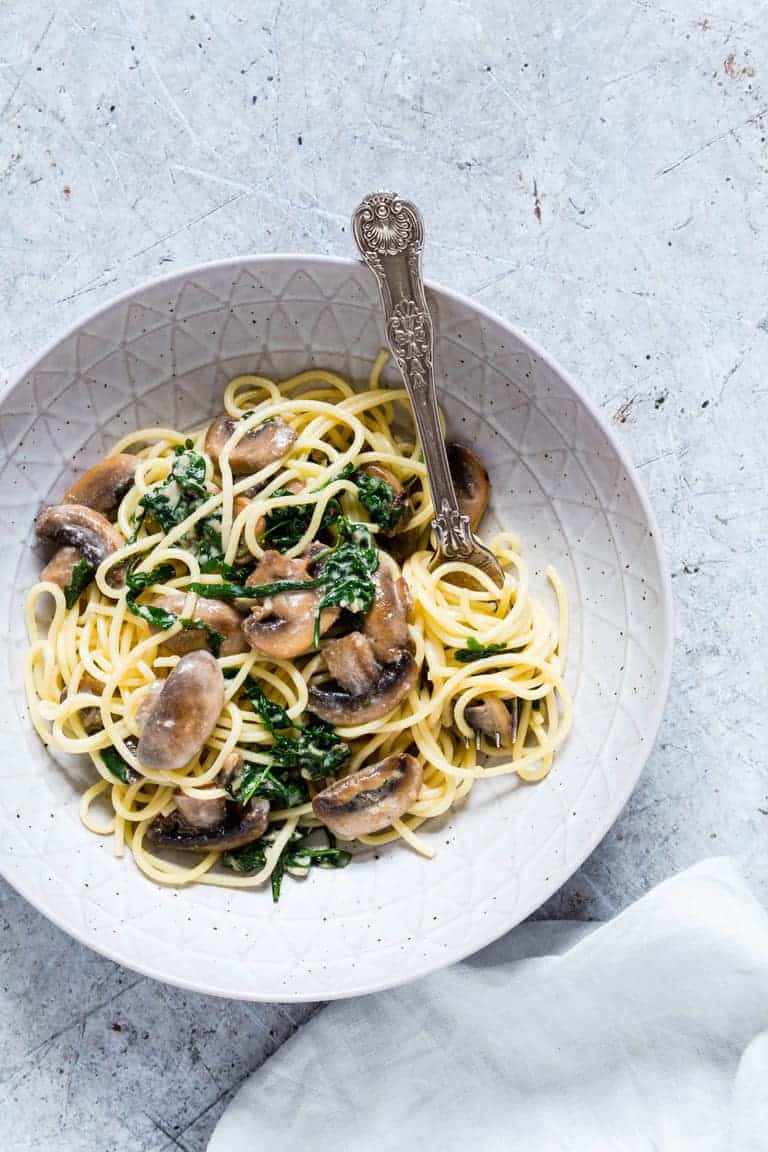 This creamy orange mushroom pasta is completed with rocket, parmesan and fresh orange juice. So simple and oh so good. Recipesfromapantry.com