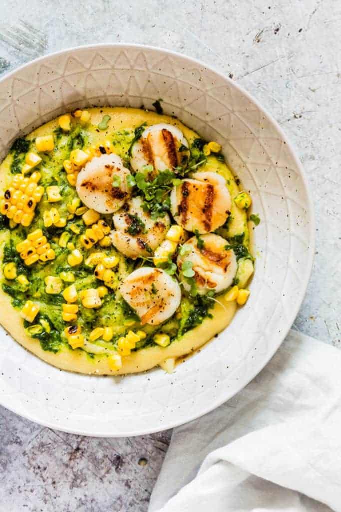These gluten-free grilled scallops with grilled corn and herb oil polenta recipe is a great bbq recipe. This is awesome. recipesfromapantry.com