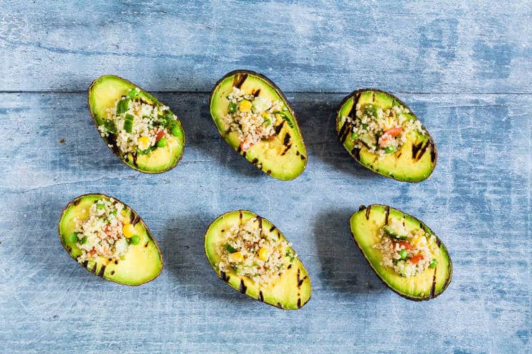  This grilled avocado stuffed with veggie quinoa is a fun veggie BBQ recipe. This is vegan and gluten-free too. Recipesfromapantry.com