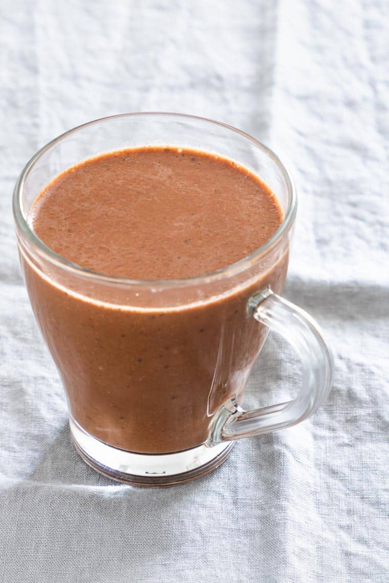 a glass of thick instant pot cocoa
