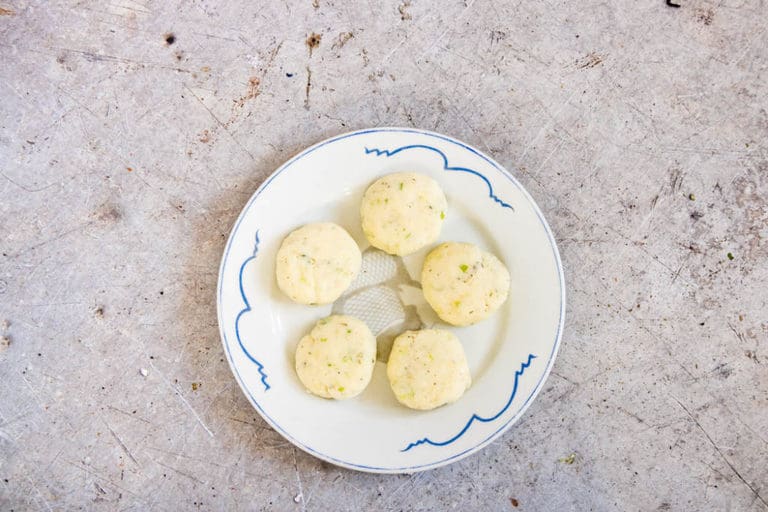 5 potato pancakes patties on a plate - recipesfromapantry.com