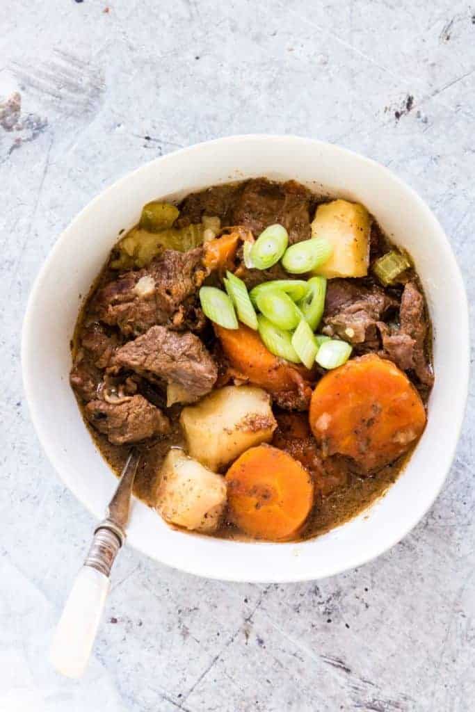 This warming, hearty and easy Instant Pot Beef Stew is quick and easy to whip up. #instantpotbeefstew #beefstew #instantpotstew #easyinstantpotrecipes #instantpotbeefstewrecipe #easyinstantpotbeefstew #glutenfreeinstantpotbeefstew #healthyinstantpotbeefstew #instantpotbeefstew #glutenfree #glutenfreerecipe #glutenfreebeefstew #glutenfreestew