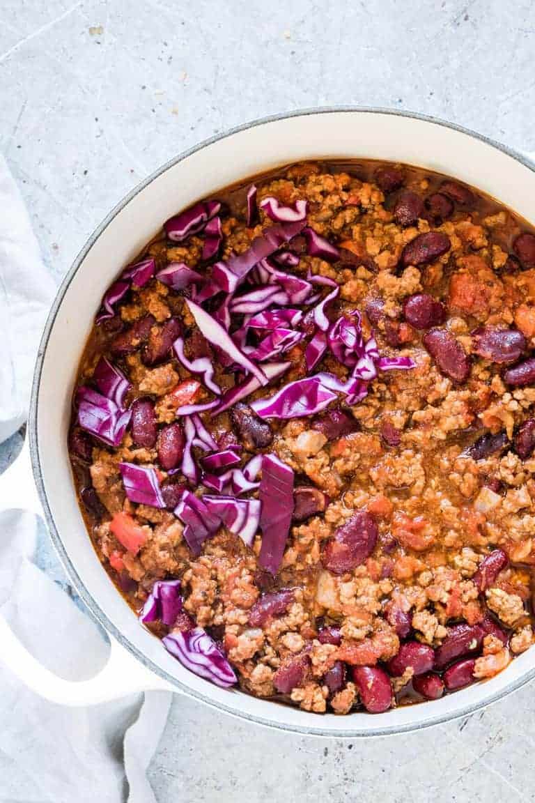 Instant Pot Chilli - Instant Pot Chilli in a white pot with red cabbage