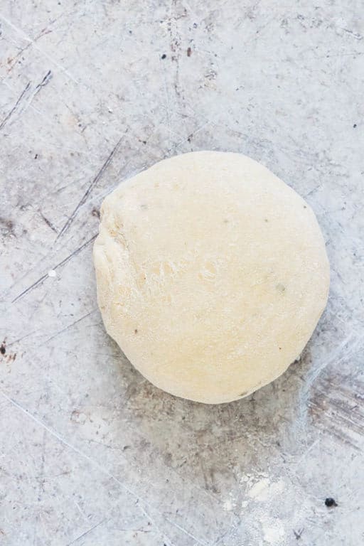 ball of Italian Pizza Dough ready to be formed into crust shape