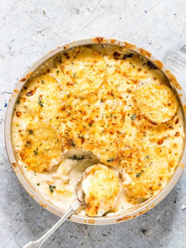 round dish filled with instant pot scalloped potatoes