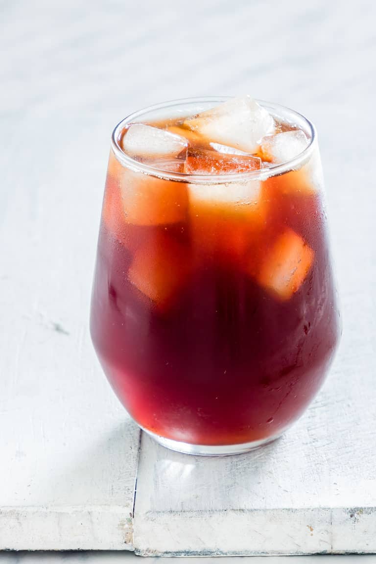 A glass of instant pot iced tea on a white table