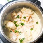 top down view of the chicken and dumplings inside the instant pot