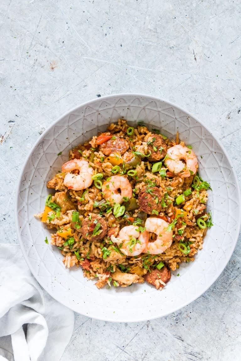 zoomed out overhead shot of instant pot jambalaya in a bowl with shrimps on top
