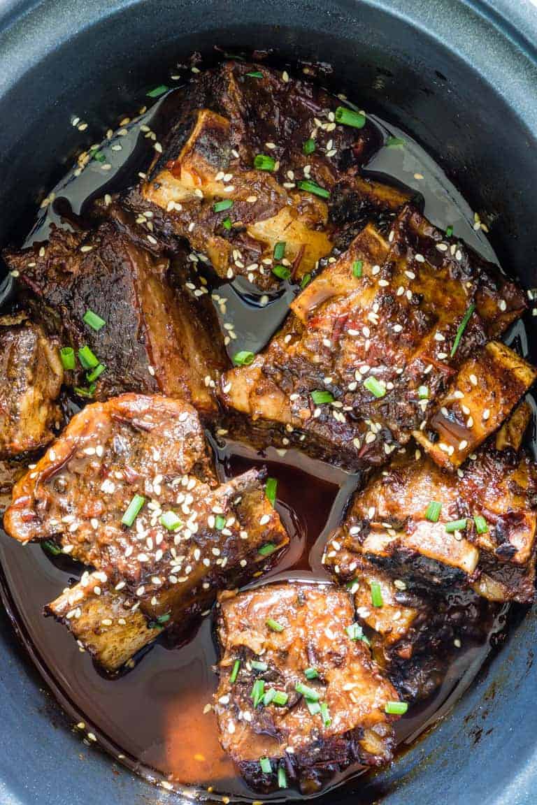 top down view of korean short ribs inside the slow cooker