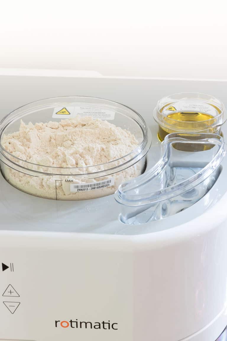 rotimatic review (roti maker) - showing flour oil and water in the containers