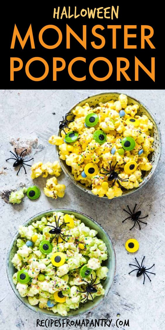 top down view of two bowls of green and yellow popcorn mixed with candy eyeballs