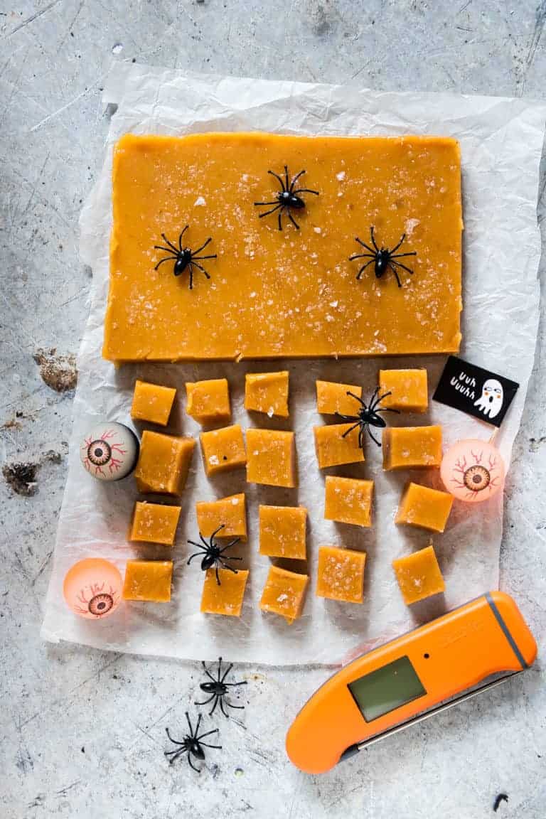 halloween decorated pumpkin salted caramels on a table