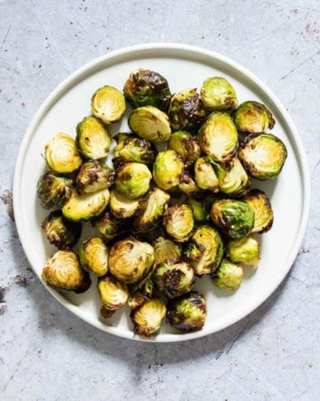 a bowl of crispy air fryer brussel sprouts