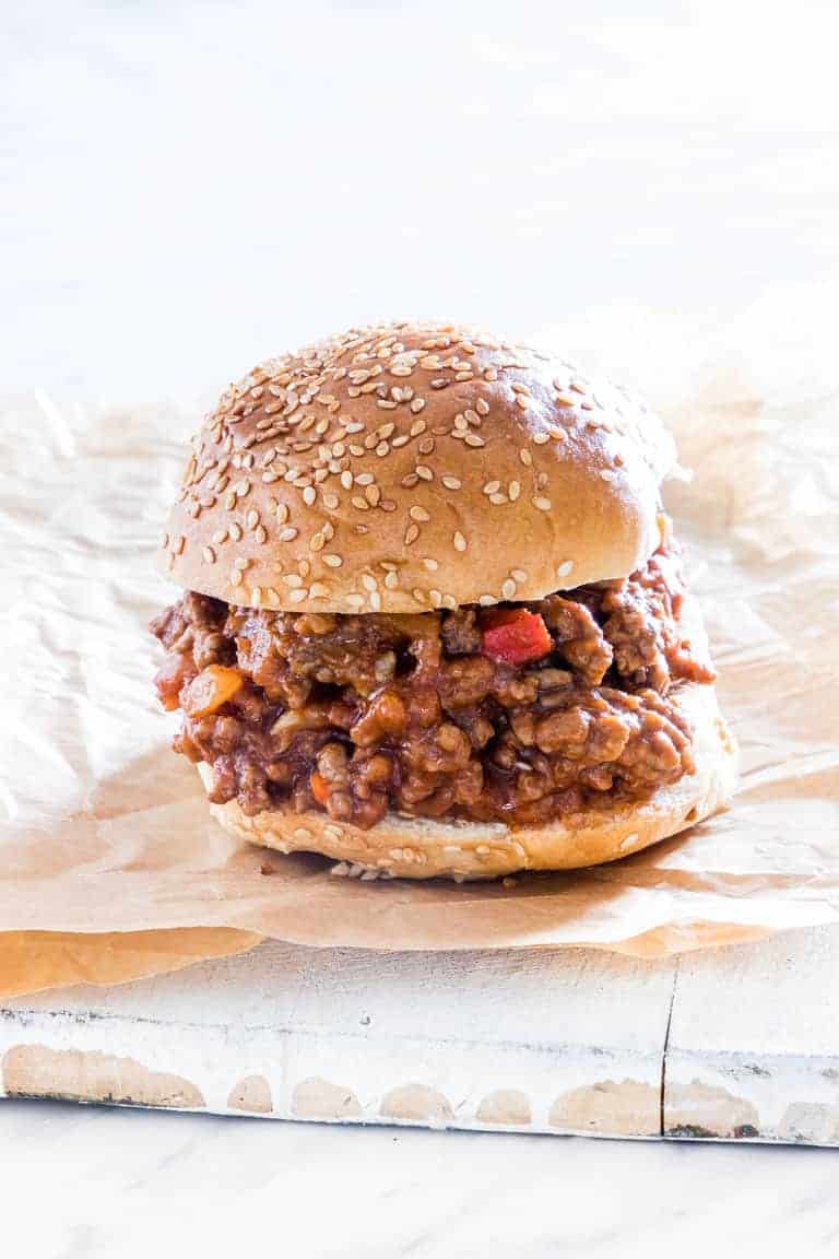 A completed serving of Instant Pot Sloppy Joes sitting on a piece of parchment paper