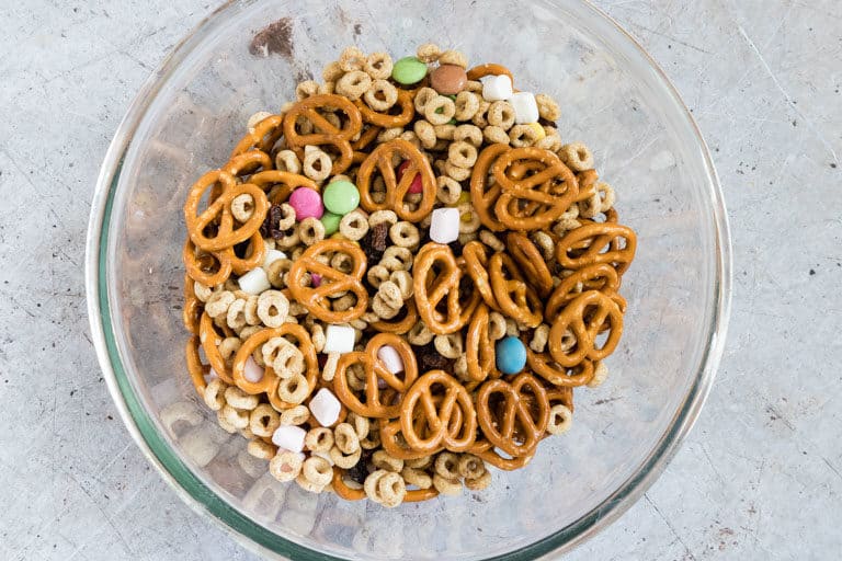 close up of a bowl of cheerios snack mix