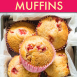 five strawberry muffins in a box