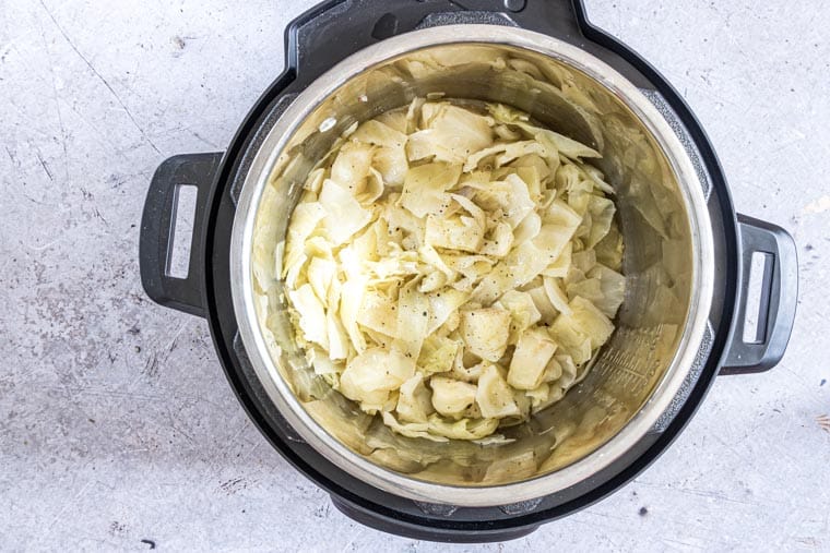 top down view of cooked buttered cabbage inside the instant pot