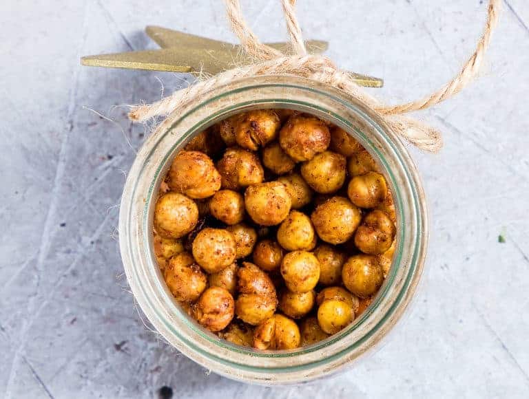 close up of Air Fryer Chickpeas in a jar - golden and crunchy