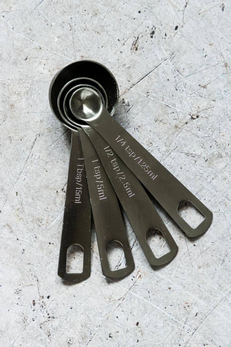 nested measuring spoons set on a counter