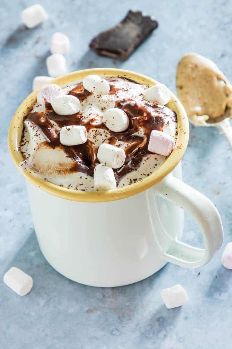 a mug of peanut butter hot chocolate with marshmallows