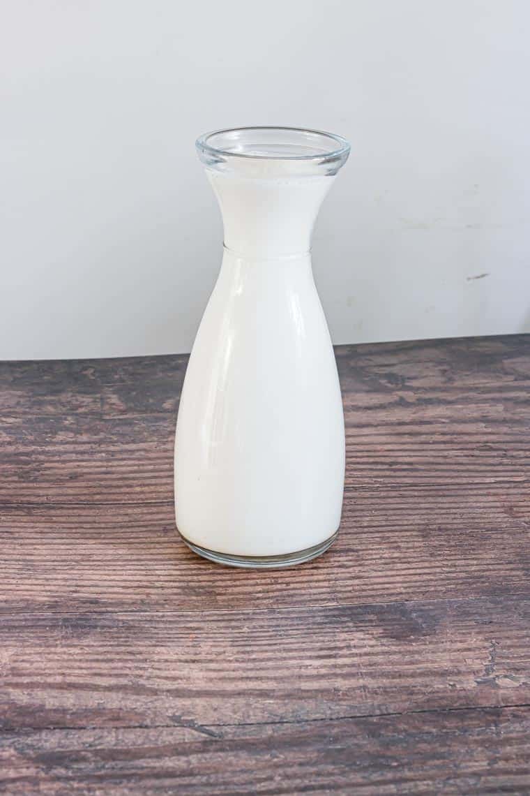 a print jug filled with milk showing how many cups in a pint