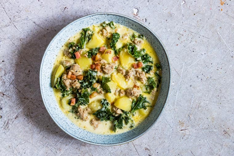 a bowl filled with Instant Pot Zuppa Toscana