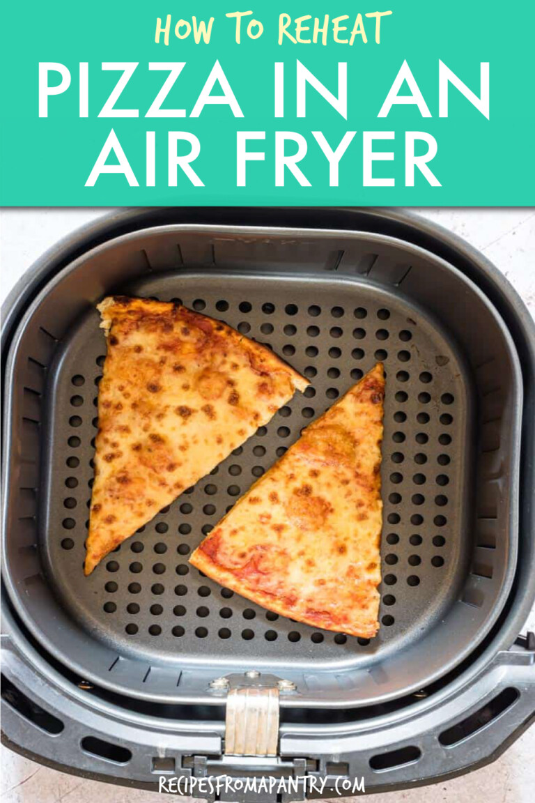 two slices of pizza in an air fryer basket