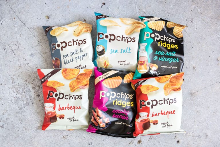 six bags of popchips in various flavours before being added to a rainbow sandwich
