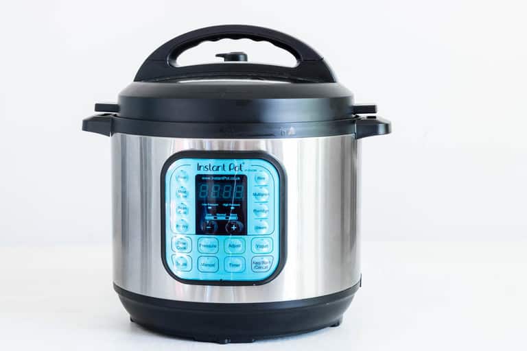 horizontal view of the instant pot duo 7-in-1 on gray background