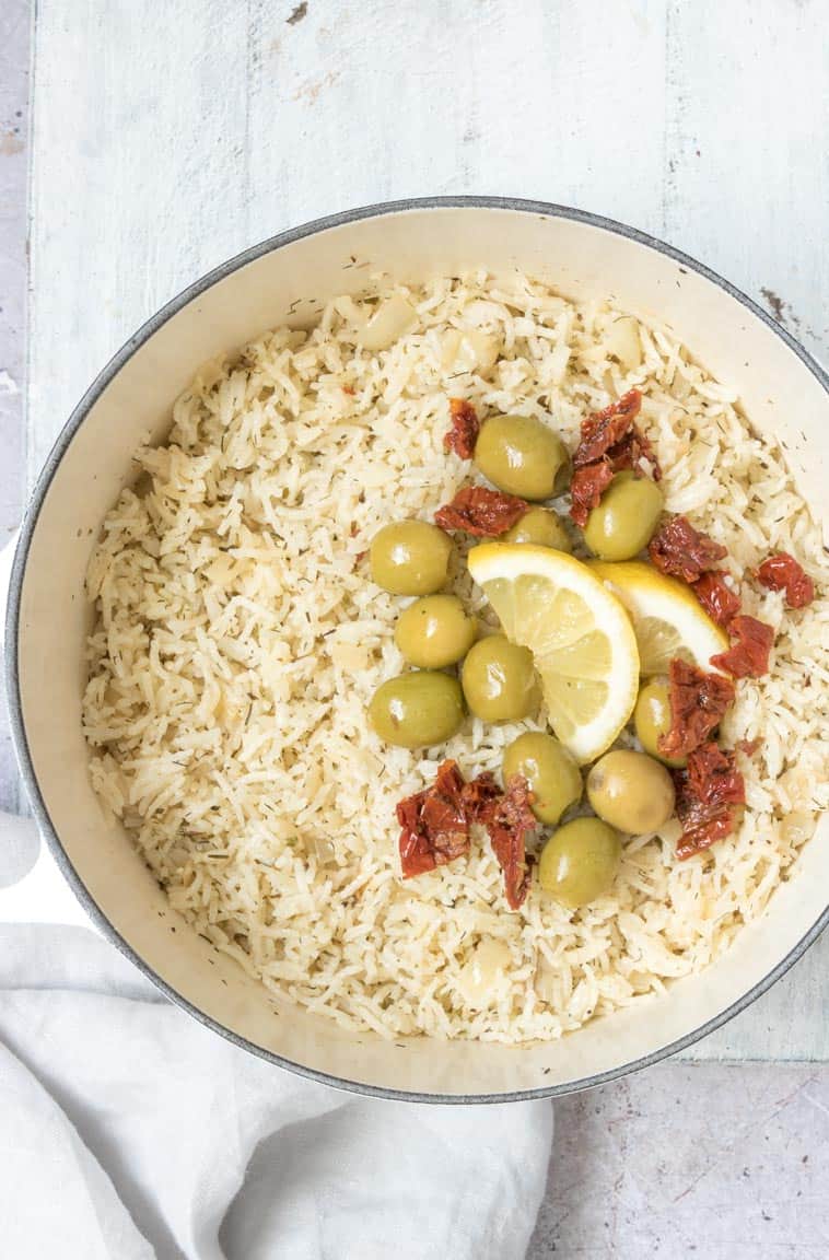 finished greek rice with olives sundried tomatoes and lemon