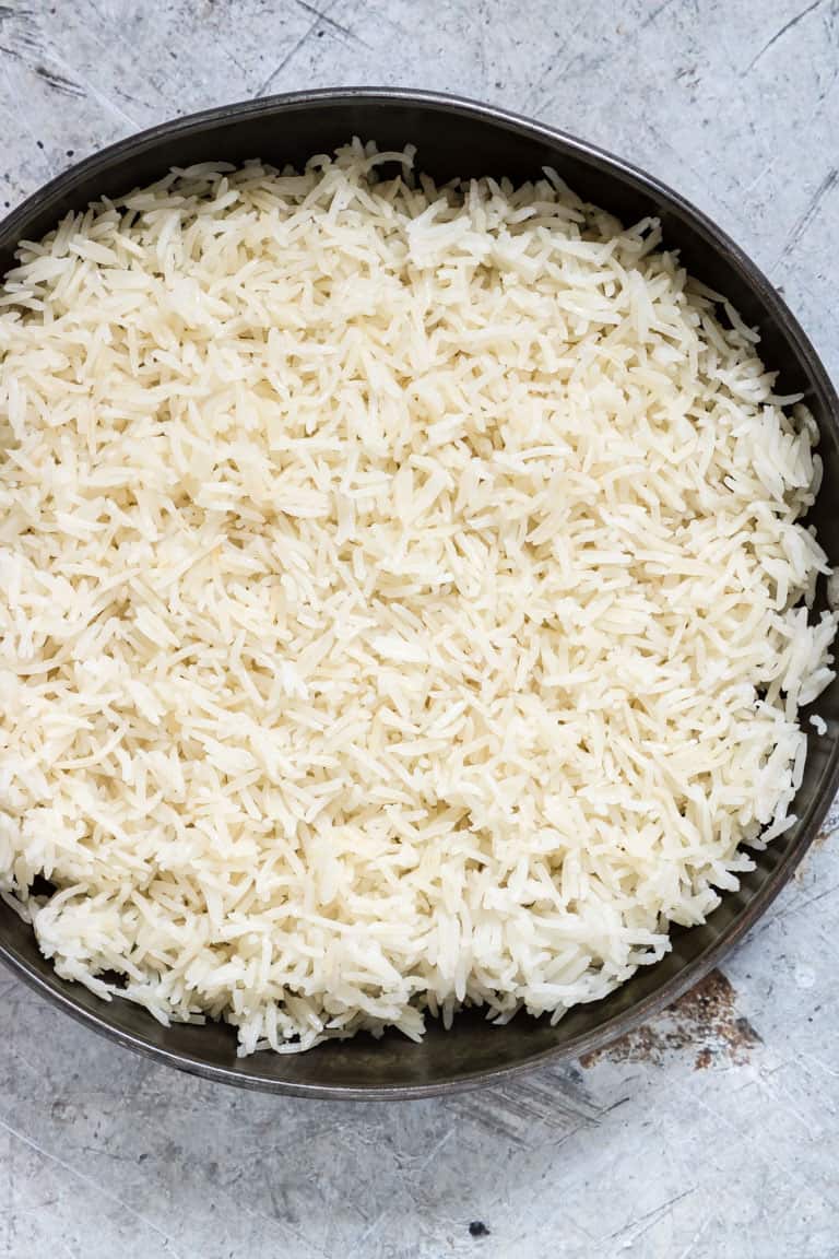overhead view of large black pot containing instant pot rice