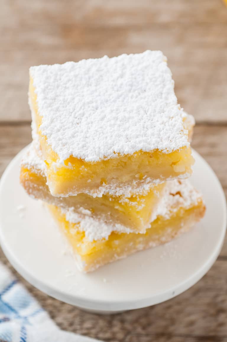 top down view of finished lemon bars served on a white platter