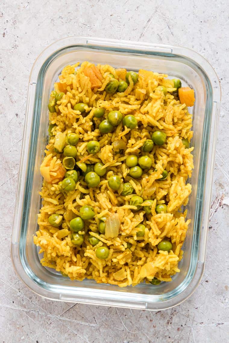 glass meal prep container filled with curry rice