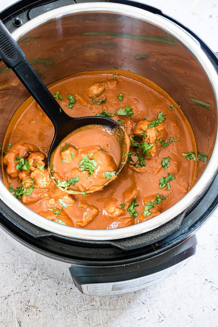 the finished instant pot butter chicken recipe inside the instant pot
